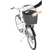 Weisses Fahrrad mit grauem Fahrradkorb und schwarzem Drahtkorb