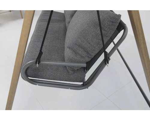 Vue détaillée d''une balançoire grise avec coussins et cadre en métal