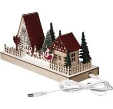 Dekorative Weihnachtsszene mit Häusern, Bäumen, Schlitten und USB-Kabel