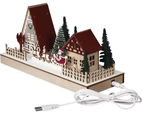 Dekorative Weihnachtsszene mit Häusern, Bäumen, Schlitten und USB-Kabel