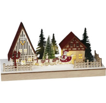 Weihnachtsdekoration mit Santa Claus, Rentieren, Häusern und Bäumen