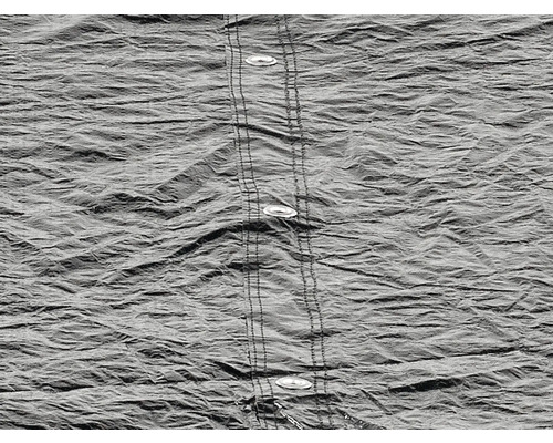 Graues Stoffmuster mit Knöpfen und Naht