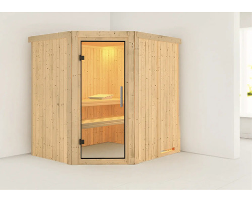 Sauna d''angle avec porte en verre et bancs en bois à l''intérieur.