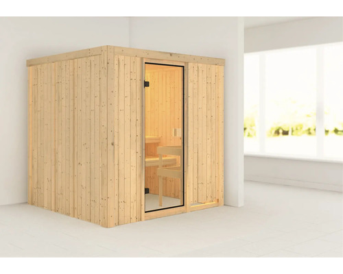 Holzsauna mit Glastür in einem hellen Raum