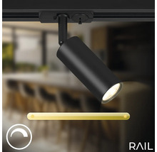 Spot LED noir sur un rail avec fonction de gradation