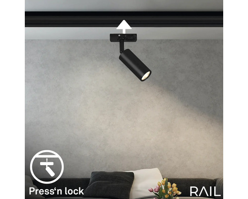 Spot LED noir sur un rail de plafond avec mécanisme ''Press''n lock''