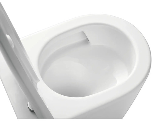 Gros plan détaillé de toilettes en céramique blanche