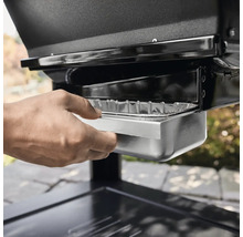 Gros plan d''un barbecue au charbon de bois avec bac à cendres amovible