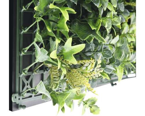 Mur végétal artificiel avec des feuilles vertes