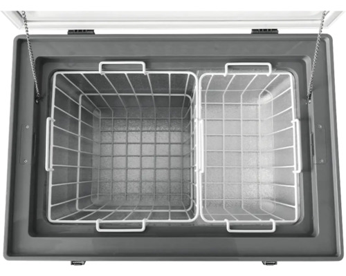 Intérieur d''un congélateur coffre avec deux paniers métalliques pour stocker les aliments