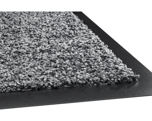 Paillasson avec surface textile et bordure