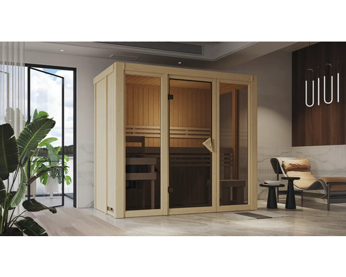 Sauna modulaire Karibu Rapido 2 avec poêle 3,6 kW y compris commande intégrée sans couronne avec porte entièrement vitrée coloris bronze Sauna en bois avec porte en verre dans une pièce aménagée de façon moderne.