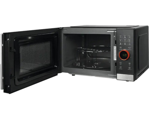 Four à micro-ondes avec porte ouverte et plateau tournant