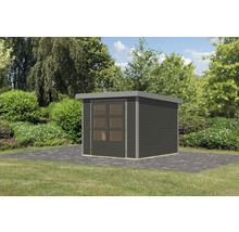 Abri de jardin en bois avec double porte et toit plat dans le jardin.