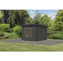 Abri de jardin moderne avec double porte et toit plat dans le jardin