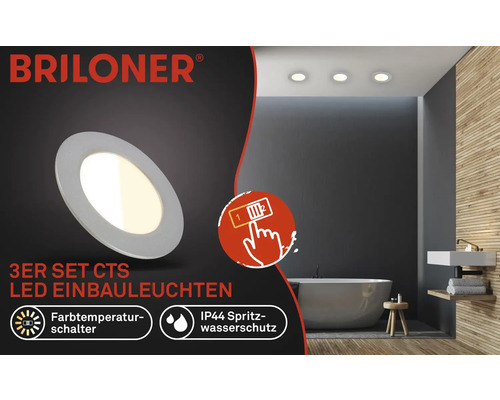 Briloner 3er Set LED Einbauleuchten in einem Badezimmer mit Badewanne, Waschbecken und Holzverkleidung.