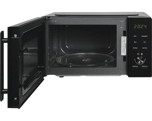 Micro-ondes avec porte ouverte et plateau tournant