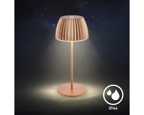 Dekorative Tischleuchte mit Lampenschirm und Schutzart IP44.