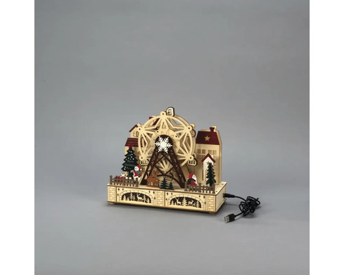 Décoration de Noël avec grande roue en bois illuminée