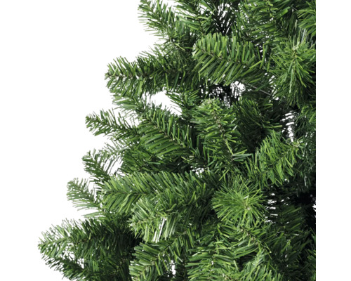 Gros plan d''un sapin de Noël artificiel avec des aiguilles vertes