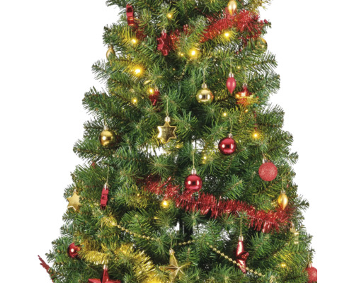Arbre de Noël décoré avec des lumières, des guirlandes et des boules de Noël