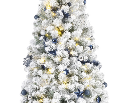 Sapin de Noël décoré et enneigé avec des boules et des lumières