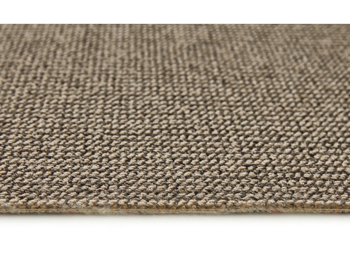 Nahaufnahme eines beigen Teppichs mit Textilstruktur