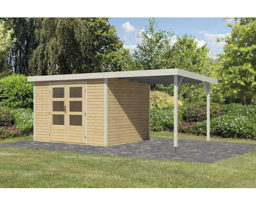 Abri de jardin en bois avec annexe couverte dans le jardin