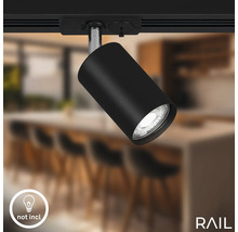 Schwarzer Schienenstrahler an einer Schiene montiert. Leuchtmittel nicht im Lieferumfang enthalten.