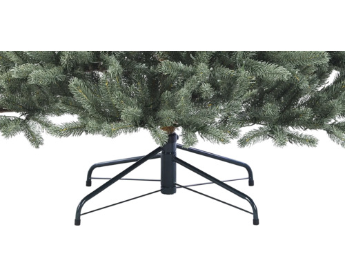 Vue détaillée d''un arbre de Noël artificiel avec support métallique
