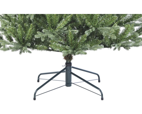 Vue détaillée d''un arbre de Noël artificiel avec un support métallique