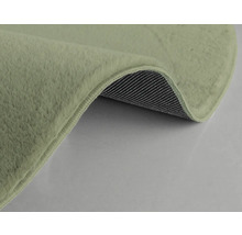 Vue détaillée d''un tapis avec velours et envers antidérapant.