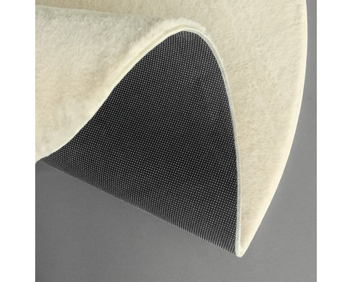 Vue détaillée d''un tapis rond avec envers de tapis