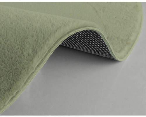 Vue détaillée d''un tapis avec poils et dessous antidérapant.