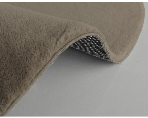 Vue détaillée d''un tapis beige à poils