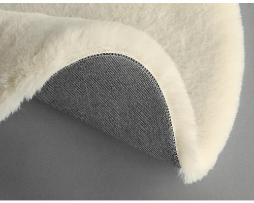 Dekoratives Schaffell mit Textilrücken