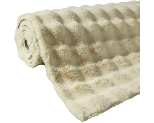 Gerollte, flauschige Kuscheldecke mit Strukturmuster