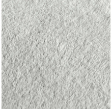 Nahaufnahme eines hellen Teppichs mit dichter Textur