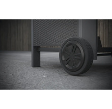 Vue détaillée d''un barbecue avec une roue