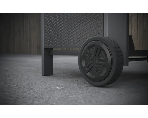 Vue détaillée d''un barbecue avec une roue