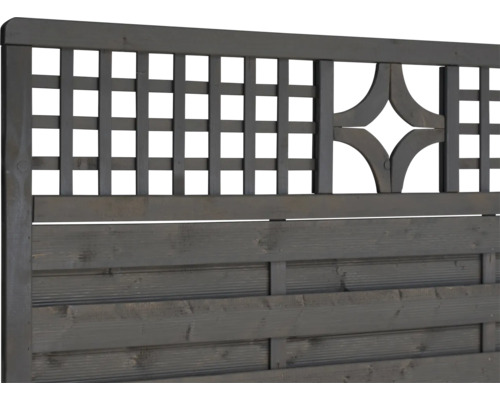 Vue détaillée d''un élément de clôture avec treillis et ornement en étoile en bois