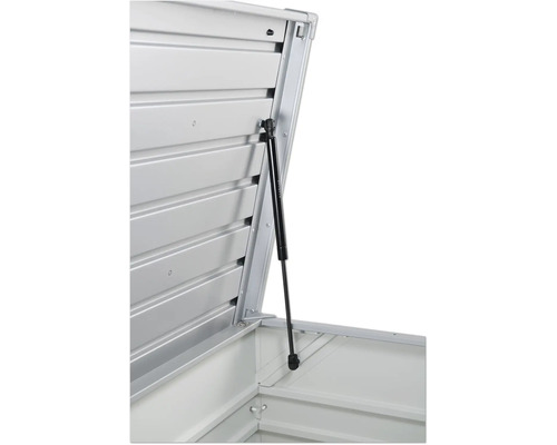 Vue détaillée d''un coffre d''équipement ouvert avec ressort à gaz