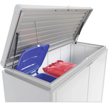 Boîte à ordures ouverte avec des poubelles bleues et rouges