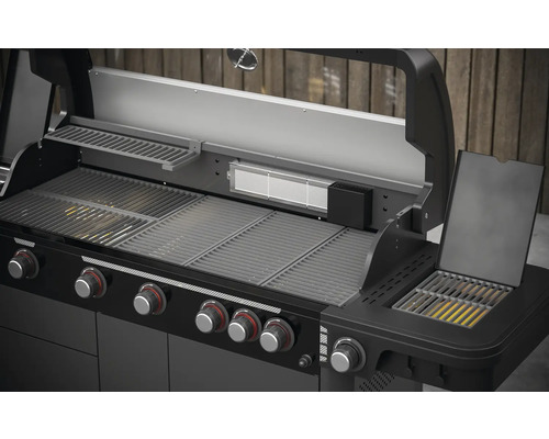 Gril à gaz ouvert avec grilles de cuisson et boutons de commande