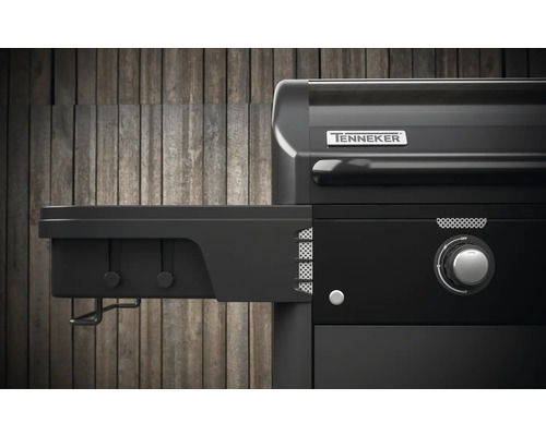 Vue détaillée d''un gril à gaz noir avec tablette latérale et logo Tenneker.