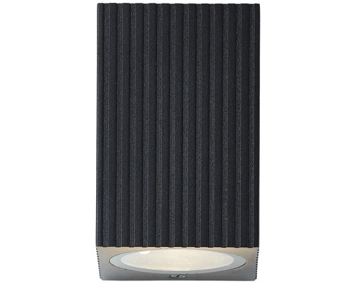 Schwarze Wandleuchte mit vertikal gerippter Oberfläche und integriertem Leuchtmittel