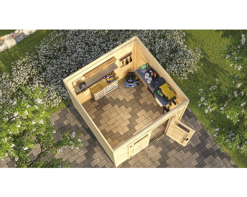 Vue de dessus d'un abri de jardin avec des outils et des équipements