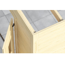 Vue détaillée d'un cabanon en bois en construction, montrant la méthode de construction