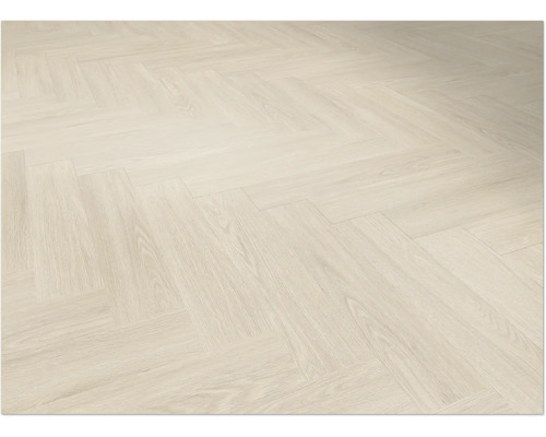 Surface de plancher en bois clair avec motif à chevrons.