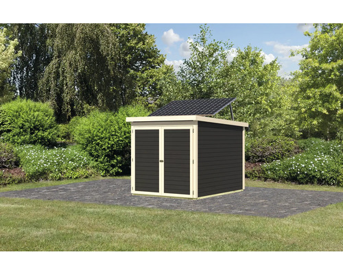 Abri de jardin avec système solaire dans le jardin